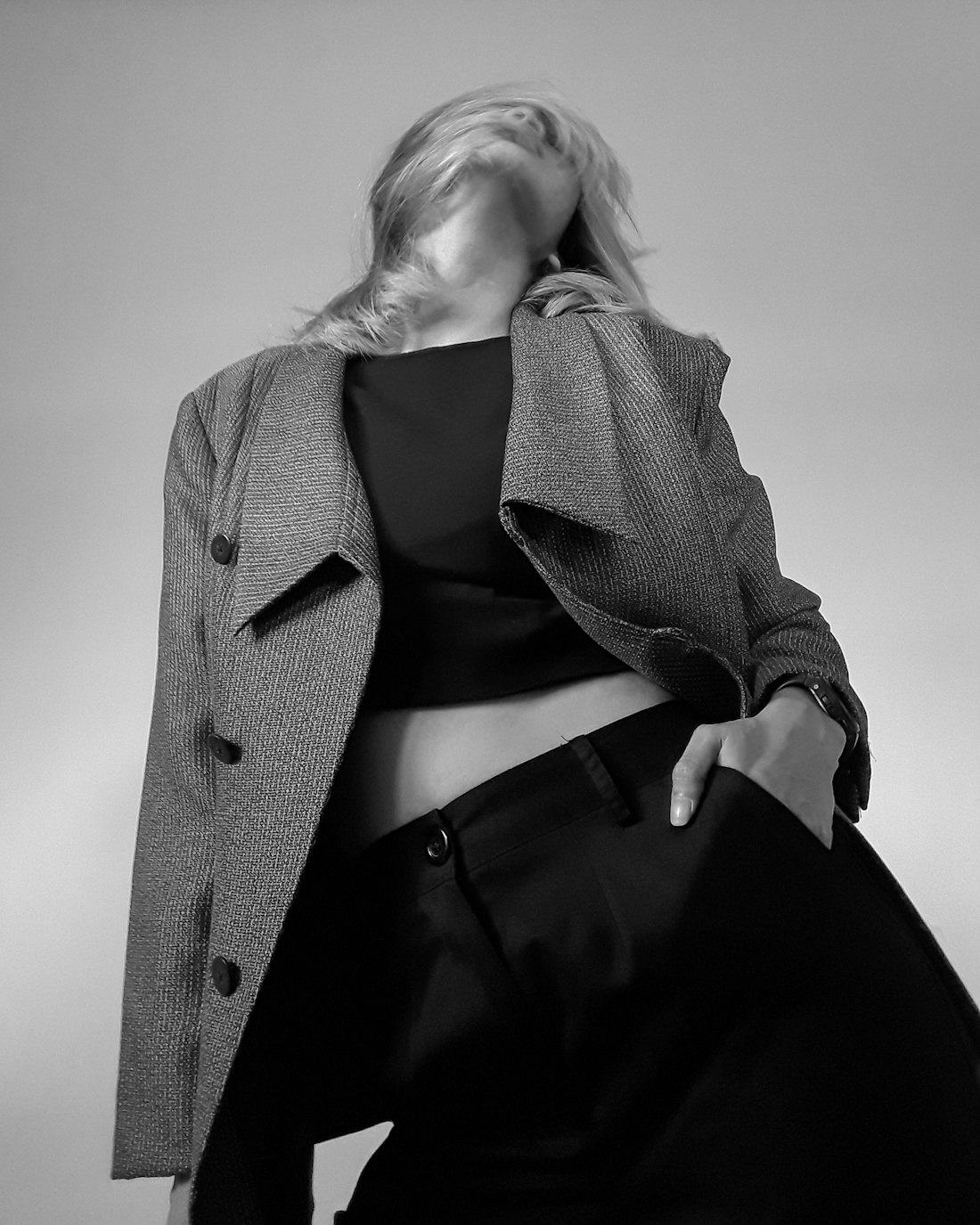 Black and white portrait in a grey wool coat